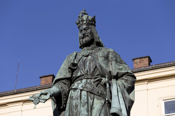 Fototapeta na wymiar Bronze statue of the eleventh Czech King and Roman Emperor Charles IV. in Prague near Charles Bridge, Czech Republic