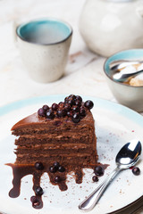 Chocolate-berry cake with currant and tea. Tea with dessert.