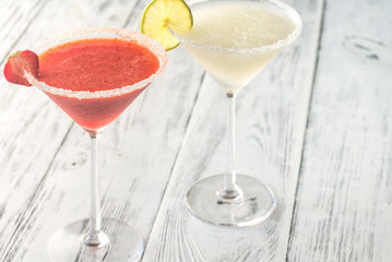 Glasses of lime and strawberry margarita cocktail