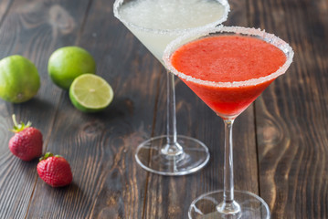 Glasses of lime and strawberry margarita cocktail