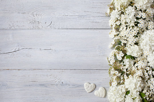 Wedding background with white flowers and heart