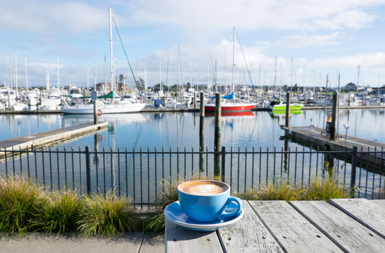 Cup of flat white coffee at Marsden Cove Marina, Whangarei, New Zealand, NZ