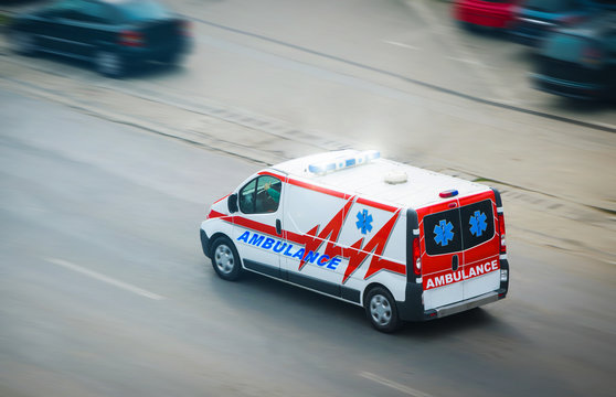     Ambulance Van With Flashing Lights 