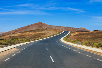 empty road on blue sky background, Lanzarote, Spain