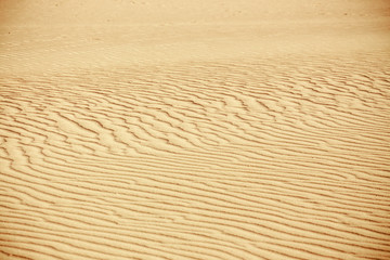 Lines in the sand of a beach, close up