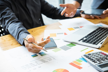 Business people using computer meeting to analyze and discuss the situation on the marketing data online in the meeting room.Business concept idea background.