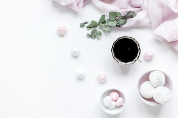 sweet marsh-mallow and flowers on woman white desk background top view mockup