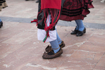 Dancing. Llanes' traditional costume.
