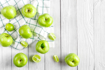 Obraz na płótnie Canvas Organic fruits with green apples mock up on white background top view