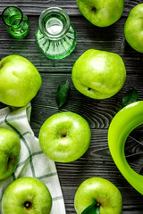 natural food design with green apples dark desk background top view pattern