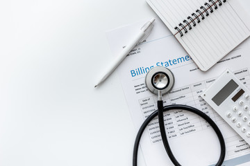 billing statement for for medical service in doctor's office background top view mock up
