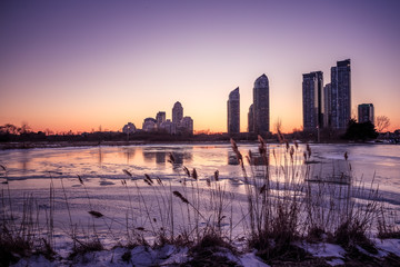Fototapeta premium Melted ice at the end of winter season. Location: Humber Bay Park, Toronto, Ontario, Canada