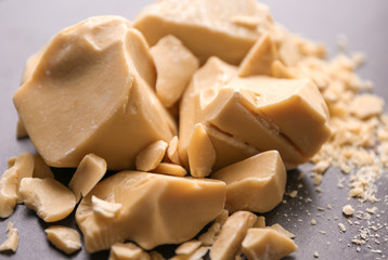Aromatic cocoa butter on table