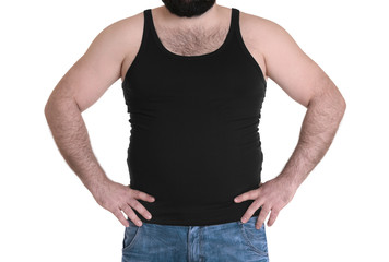 Adult man in undershirt and jeans on white background. Weight loss concept