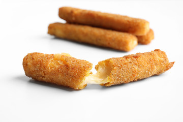 Fried cheese sticks on white background