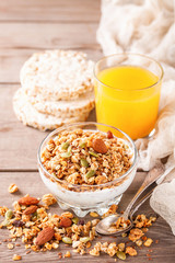 Muesli and yogurt in a glass on a table. Selective focus. Copy space for text