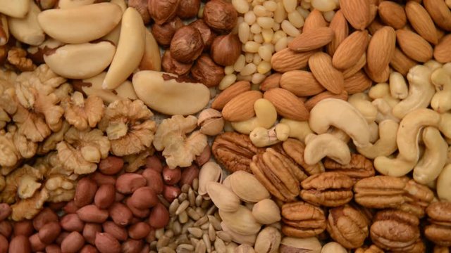 Nuts mix in a canvas bag in table.