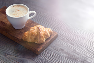 Coffee with croissant