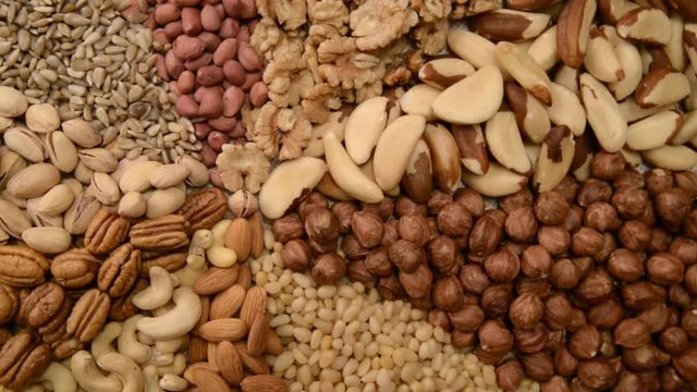 Nuts mix in a canvas bag in table.