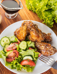 Chicken wings in sauce