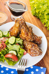 Chicken wings in sauce