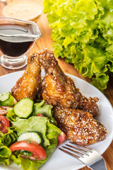 Chicken wings in sauce