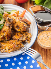 Chicken wings in sauce