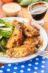 Chicken wings in sauce