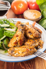 Chicken wings in sauce