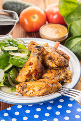 Chicken wings in sauce