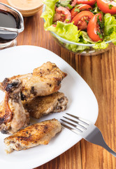 Chicken wings in sauce