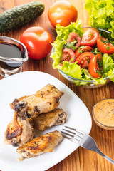 Chicken wings in sauce