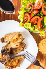 Chicken wings in sauce