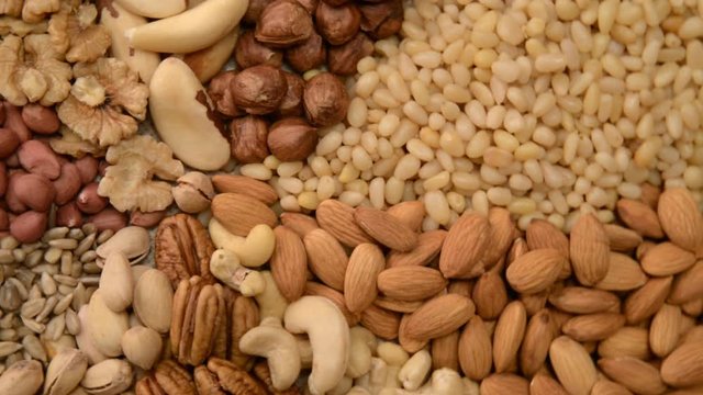 Nuts mix in a canvas bag in table.