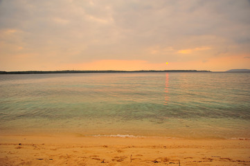 Fototapeta na wymiar Beach on Tropical Islands at Sunrise