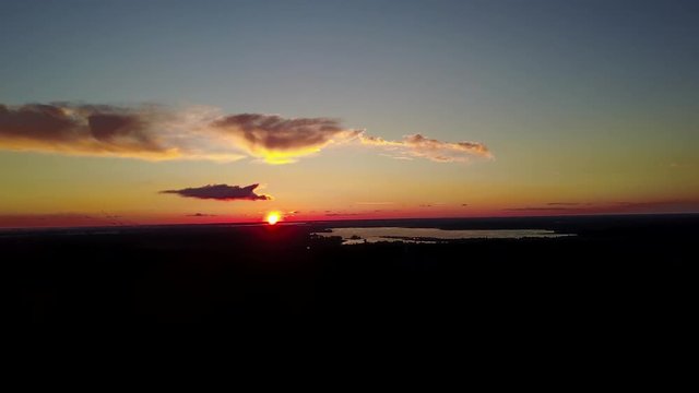 evening dusk sunset Aerial view of countryside, drone top view 4K UHD video