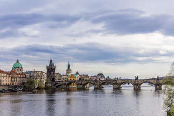 View of the Charles Bridge from the side of the Manes Bridge. The River Vltava. Area of the Old Town. Prague, Czech Republic.