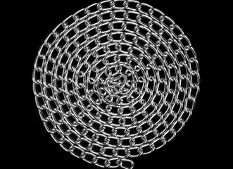 Chain heap - abstract metal background. Collection silver jewelry chains on an isolated black...