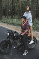 Fototapeta na wymiar Caucasian couple on motorcycle