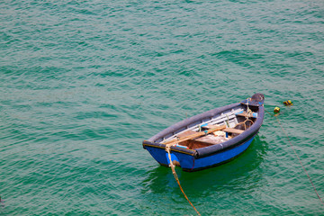 Boat on calm sea  in Cascais Bay, Cascais, Portugal