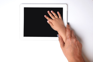 child playing on tablet, isolated on a white background