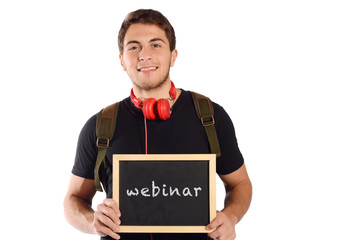 Man holding chalkboard with 