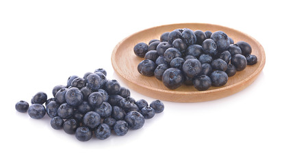 Fresh juisy blueberries isolated on white background