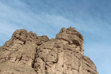 Fototapeta premium Brown Mountains against a Blue Sky in Xunhua County, Qinghai Province China Amdo Tibet Asia