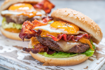 Bacon Burger with Egg Lettuce and Cheese - obrazy, fototapety, plakaty
