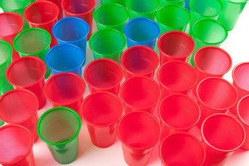 Multicolor plastic glasses isolated on white background