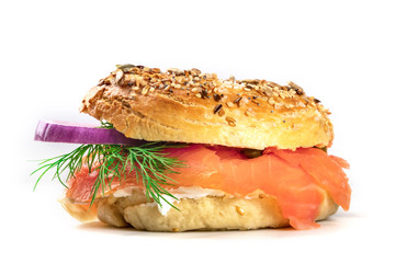 Sesame bagel with cream cheese and lox, on white
