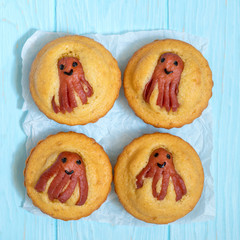 Kid funny food. Cornbread muffins with sausage octopus