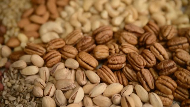 Nuts mix in a canvas bag in table.