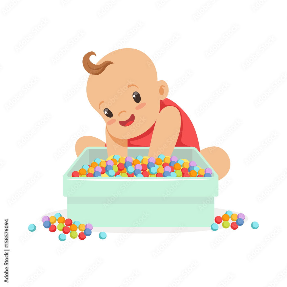 Wall mural Cute happy baby sitting and playing with box full of multicolored small balls, cartoon character vector Illustration